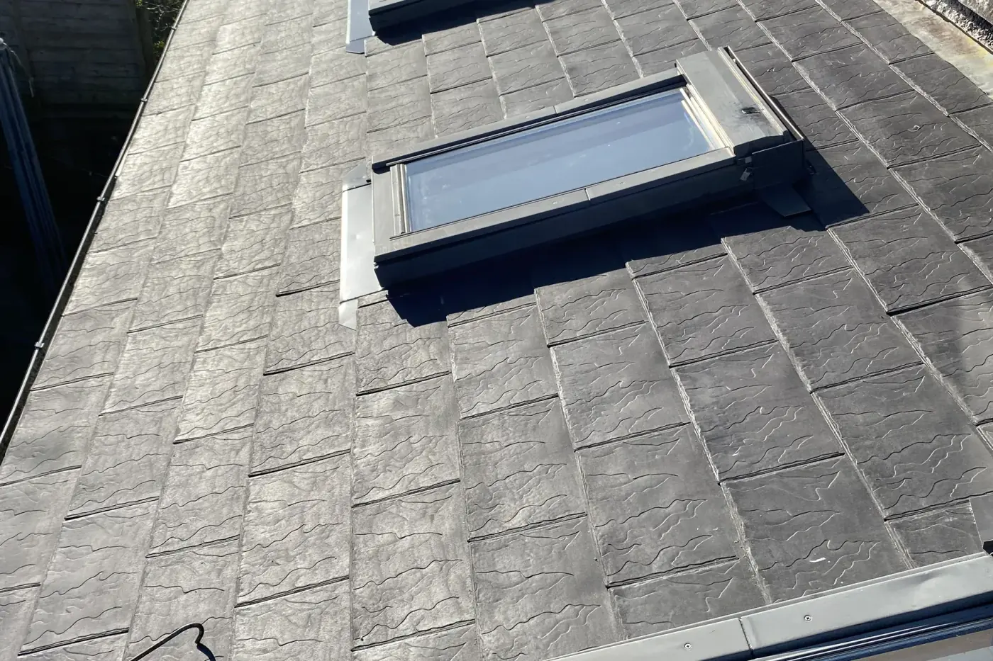 Tiled roof with scaffolding during roofing work