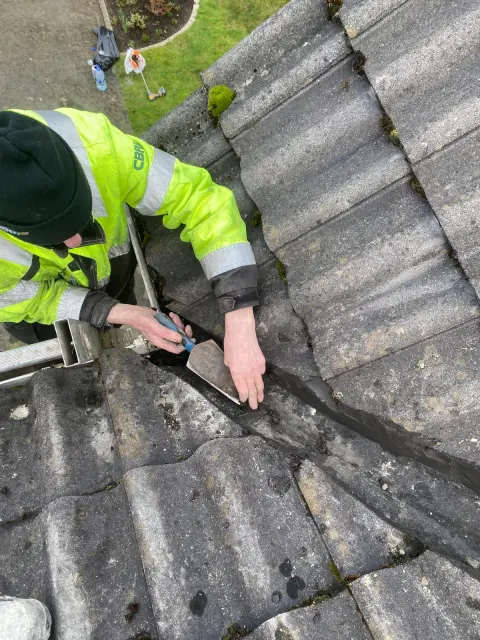 AG Direct roof repair work around a tiled roof valley